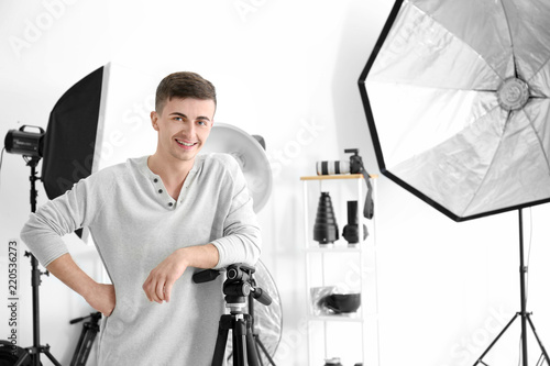 Young male photographer in ...