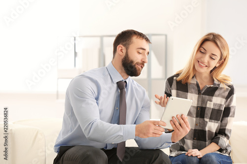 Consulting manager with woman at meeting in office