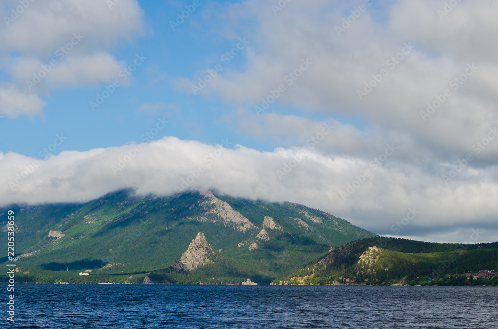Beautiful landscape, lake, mountains in clouds and nature. Beautiful landscape, lake, mountains in clouds and nature.