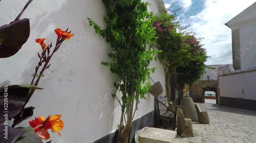 Historic streets of the old town of Faro in motion. Portugal.