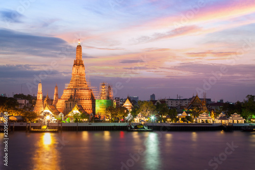 Wat Arun, Famous thai templ located next to the river during sunset