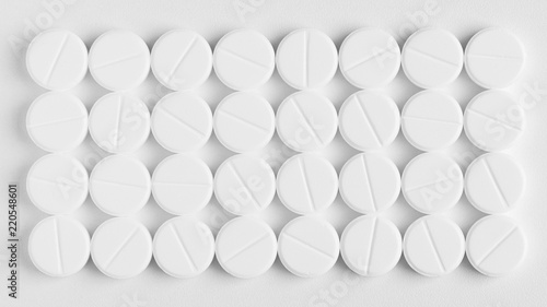 Fototapeta Naklejka Na Ścianę i Meble -  A number of white medicinal tablets