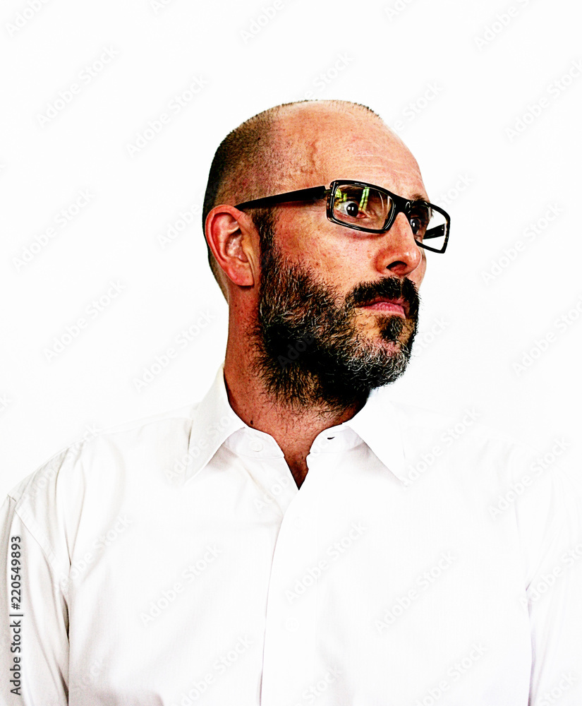 Bearded man with eye glasses in white shirt. Bearded man with eye glasses in white shirt.