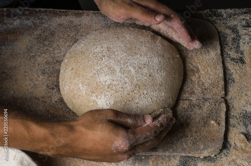 Baker cooking bread.