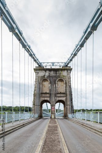 Menai Suspension Bridge between Anglesey and mainland of North Wales, UK. The bridge, opened in 1826, is known as the first modern suspension bridge in the world.
