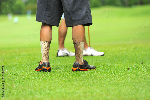 dirty legs of golf player