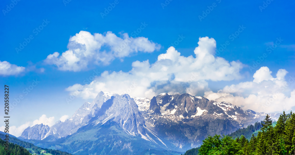 View on mountain landscape with snow in Austrian Alps