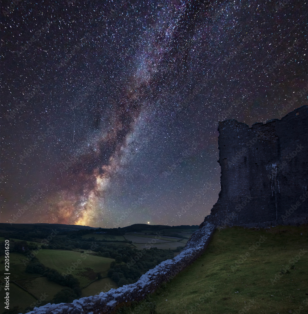 Vibrant Milky Way composite image over landscape of medieval castle ruins - obrazy, fototapety, plakaty 