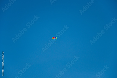 Background colorful balloons flying in the blue sky