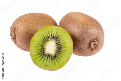 Two whole and one half ripe and fresh Kiwi fruit isolated on white background