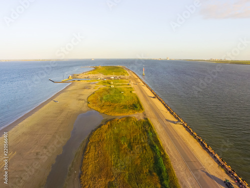 Aerial view famous Texas City Dike, a levee that projects nearly 5miles south-east into mouth of Galveston Bay. It was designed to reduce the impact of sediment accumulation along the lower Bay photo