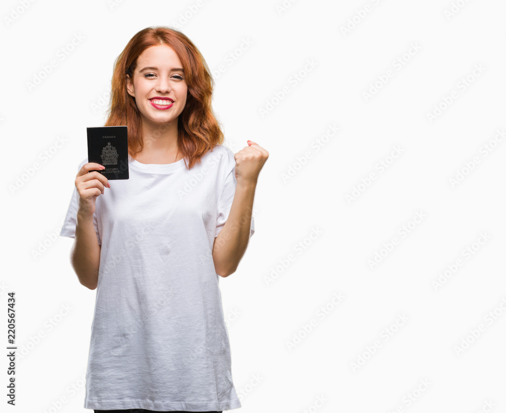 Young beautiful woman holding passport of canada over isolated background screaming proud and celebrating victory and success very excited, cheering emotion Young beautiful woman holding passport of canada over isolated background screaming proud and celebrating victory and success very excited, cheering emotion