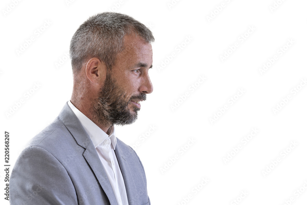 profile businessman. Side view portrait of young serious confident man in suit isolated on white background profile businessman. Side view portrait of young serious confident man in suit isolated on white background