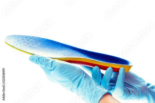 orthopedic insole in the hands