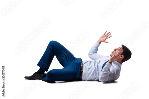 Obraz na plátně Businessman lying on the floor isolated on white