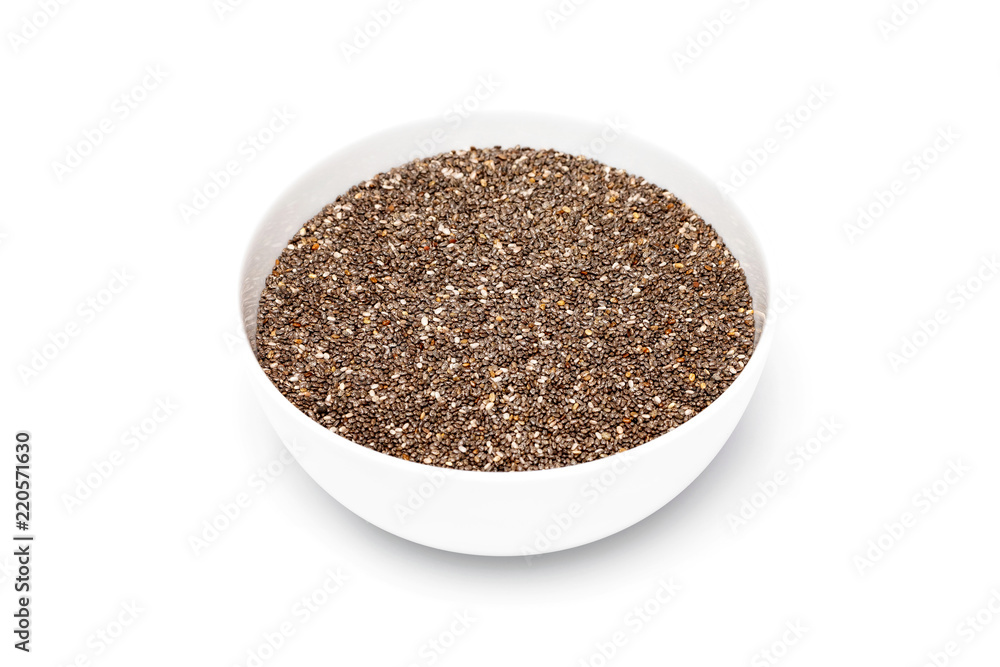 Closeup bowl of raw chia seeds isolated at white background. Closeup bowl of raw chia seeds isolated at white background.