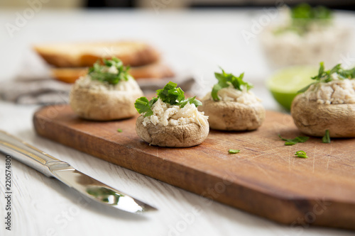 Mushroom and chicken puree with lime and toasts, side view. Closeup. Selective focus.