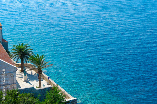 Fototapeta Naklejka Na Ścianę i Meble -  View from the top of an ancient city of Rab, located on a beautiful island on the Adriatic coast in the heart of Mediterranean sea. Surrounded by the crystal clear turquoise sea.