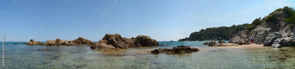 Scenic view of rocks at Santa Cristina beach, Catalonia, Spain.