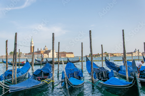 View of some fascinating docked gondolas in Venice Italy 