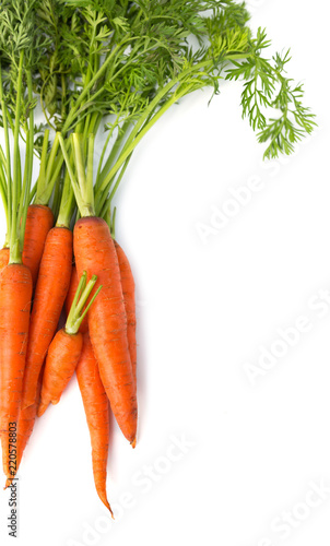 Fresh carrot heap vegetables isolated on white