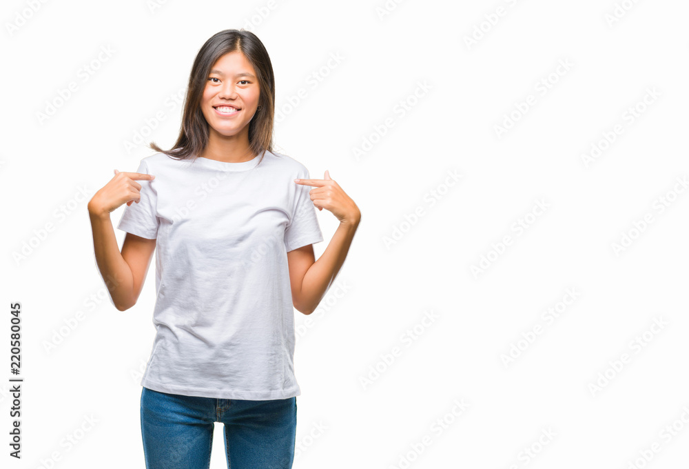 Young asian woman over isolated background looking confident with smile on face, pointing oneself with fingers proud and happy. Young asian woman over isolated background looking confident with smile on face, pointing oneself with fingers proud and happy.