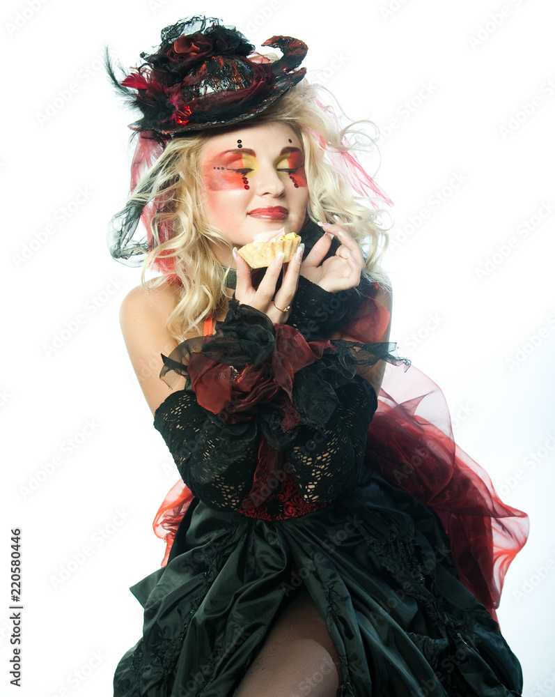 young woman with creative make-up with cake. young woman with creative make-up with cake.