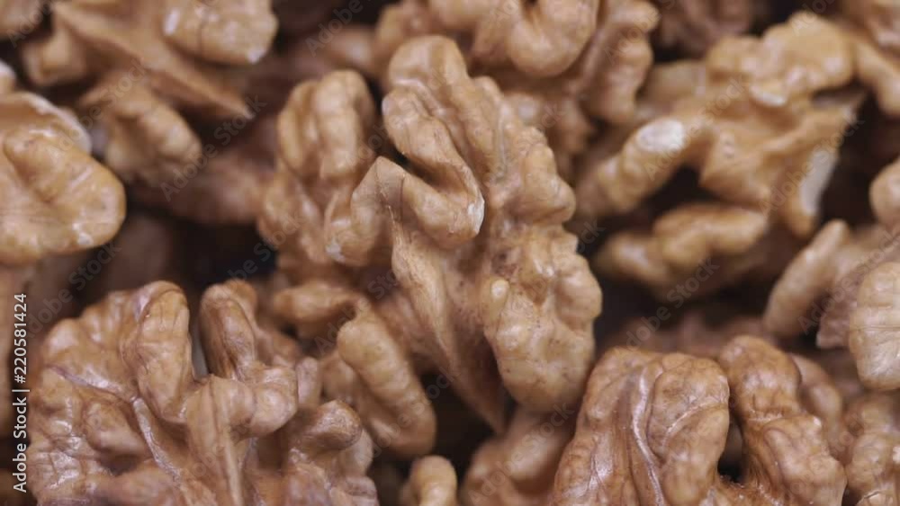 Walnut closeup. Rotating nuts background Walnut closeup. Rotating nuts background