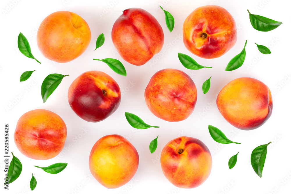 ripe nectarine with leaves isolated on white background. Top view. Flat lay pattern ripe nectarine with leaves isolated on white background. Top view. Flat lay pattern