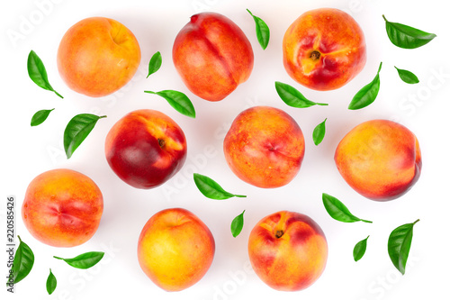 ripe nectarine with leaves isolated on white background. Top view. Flat lay pattern
