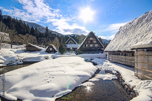 Historic Villages of Shirakawa-go and Gokayama, view of the sunset, Japan.Winter in Shirakawa-go/Japan.Traditional style huts in Gassho-zukuri Village, Shirakawago and Gokayama, World Heritage Site. photo