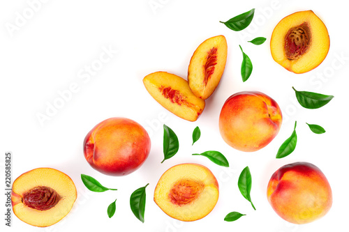 ripe nectarine with leaves isolated on white background with copy space for your text. Top view. Flat lay pattern