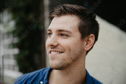 Attractive Young Man Model Smiling and Posing Down Town