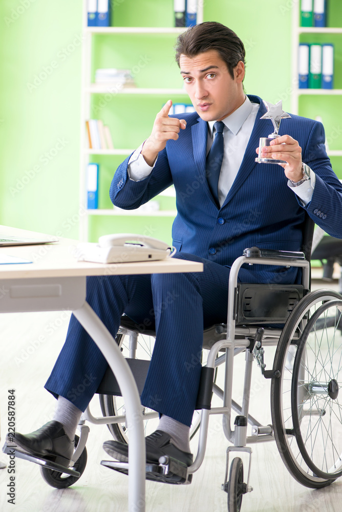 Disabled businessman working in the office Disabled businessman working in the office
