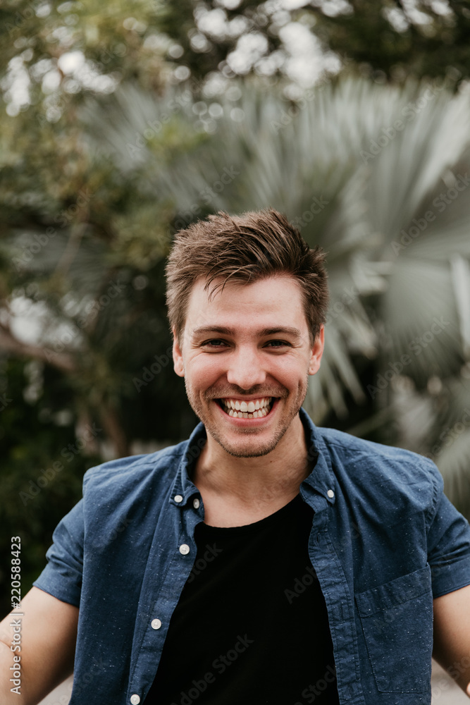 Attractive Young Man Model Smiling and Posing Down Town Attractive Young Man Model Smiling and Posing Down Town