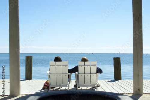 Couple Looking At The Sea photo