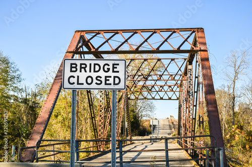 Bridge closed sign on an old bridge