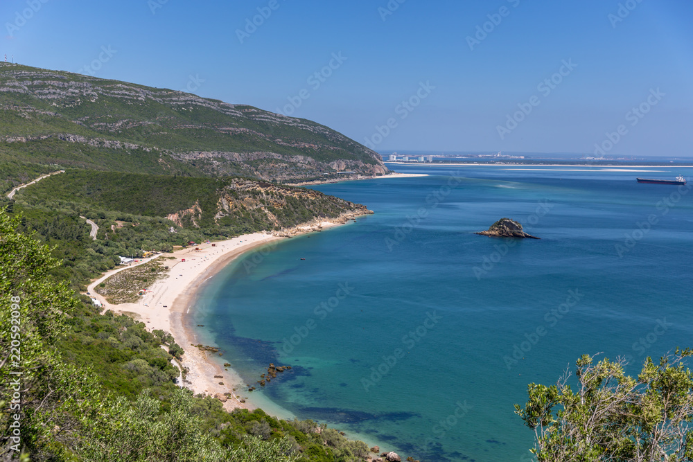 Amazing blue water beach in Arrábida, Alentejo in Portugal Amazing blue water beach in Arrábida, Alentejo in Portugal