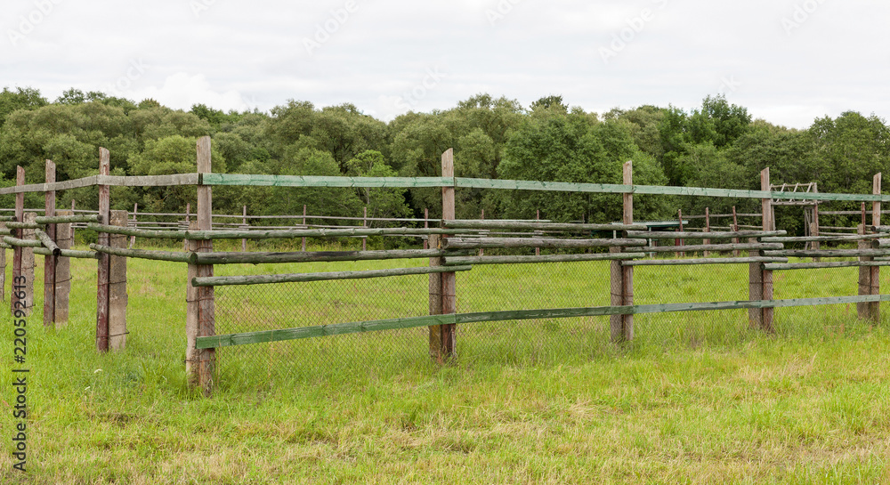 fence of wooden poles