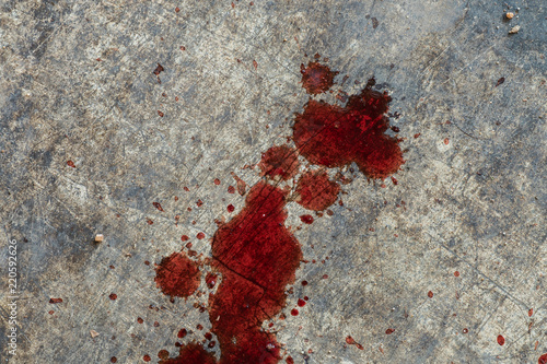 Blood on cement floor.