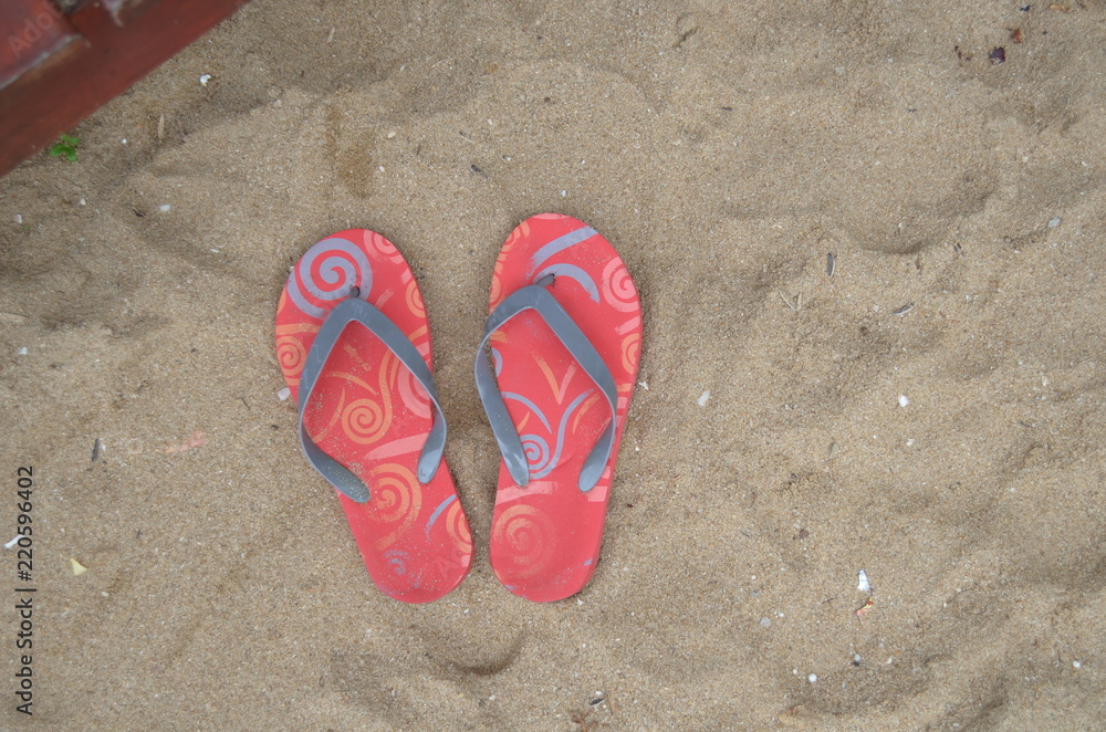 Fototapeta premium Slippers on the beach