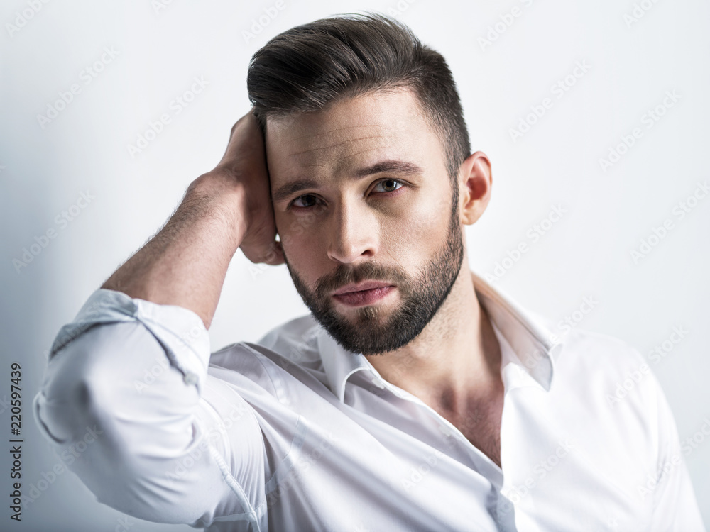 Handsome man in white shirt. Closeup portrait. Handsome man in white shirt. Closeup portrait.