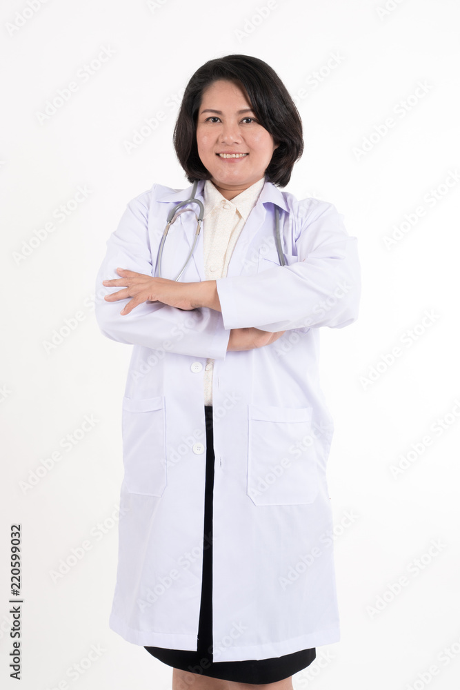Smiled kindness asian female doctor standing isolated on white background. Smiled kindness asian female doctor standing isolated on white background.