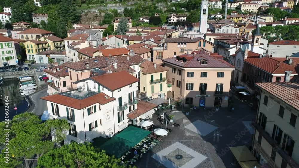 Village of Menaggio, houses and square. Famous destination on Como lake. Aerial view Village of Menaggio, houses and square. Famous destination on Como lake. Aerial view