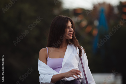 Happy woman in lunapark photo