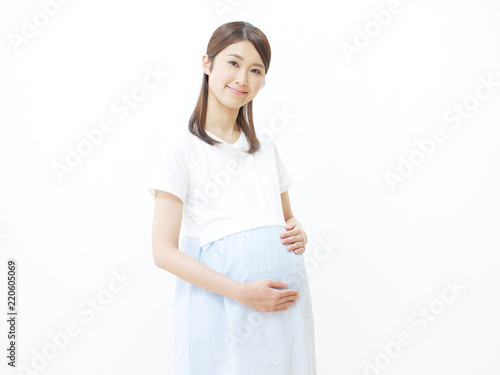 女性 妊婦 笑顔