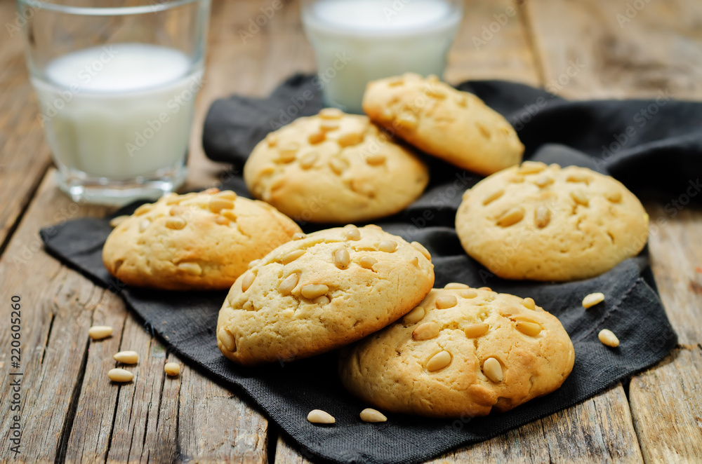 Pine nuts cookies with glasses of milk