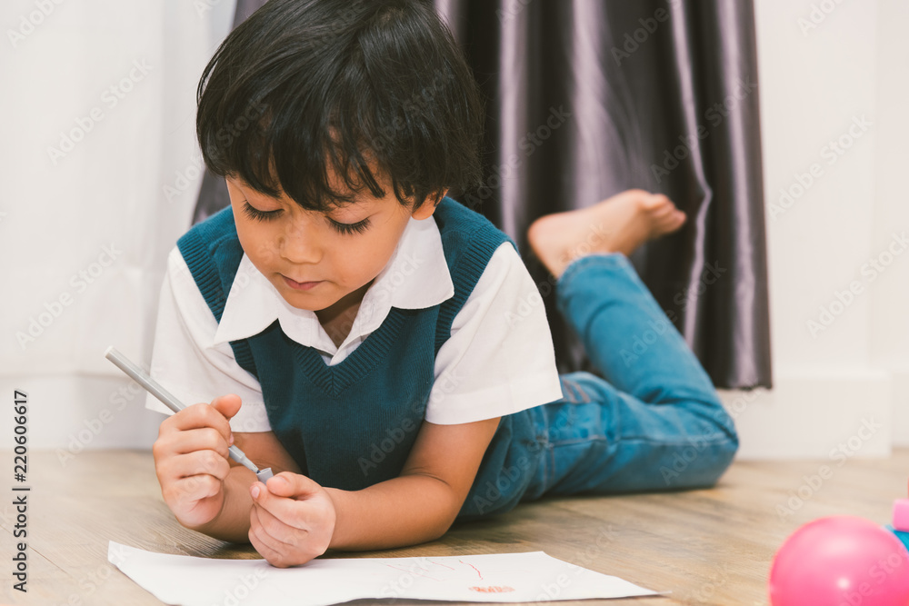 Happy child kid boy kindergarten drawing on peper teacher education Happy child kid boy kindergarten drawing on peper teacher education