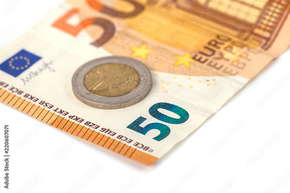 Stack of Euro banknotes and coins isolated. 50 Euro banknot Stack of Euro banknotes and coins isolated. 50 Euro banknot