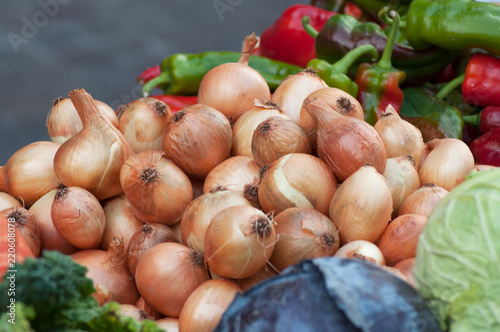 closeup of onions pile at the market